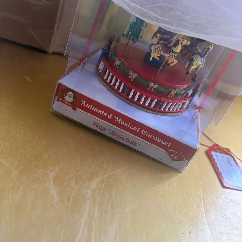 Animated Musical Carousel with Red and Green Accents - Picture 7 of 7